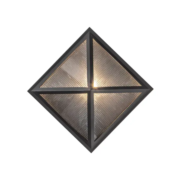 The Cairo wall sconce brings architectural sophistication to any space with its pyramid-inspired design and ribbed glass. Versatile for both indoor and outdoor use, this transitional fixture combines strong metal frames with elegant glass details.