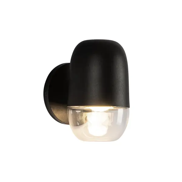 The Yara wall sconce brings contemporary elegance outdoors with its racetrack-inspired curves and matte black finish. Integrated LED provides warm 3000K lighting, while clear glass accents add sophistication to any exterior space.