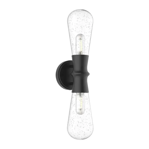 The Marcel wall sconce combines swooping clear bubble glass with a textured black metal frame for a contemporary aesthetic. Its compact 5-inch design and weather-resistant construction make it ideal for both interior and exterior applications.