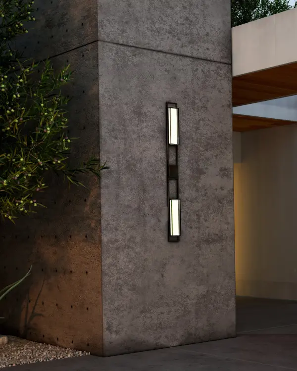 The Aspen 60-inch wall sconce delivers dramatic scale and contemporary elegance for outdoor spaces. Its integrated LED provides warm, omni-directional illumination perfect for grand entrances and expansive facades. - alternate view