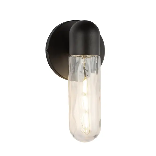 The Lima wall sconce delivers contemporary sophistication with its distinctive pill-shaped silhouette and matte black finish. Water glass accents create warm, inviting illumination perfect for modern exteriors and interiors alike.