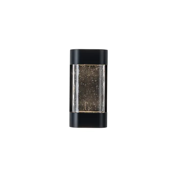 The Moondew combines hand-crafted art glass with formed aluminum in a sleek 12-inch design. Integrated LED with warm 3000K light creates ambient glow while showcasing glass texture. Rated for exterior use but equally stunning indoors.