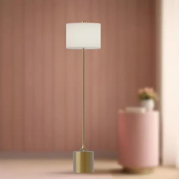 The Issa floor lamp brings 1960s pottery aesthetics to modern interiors with its sculptural curves and elegant simplicity. The brushed gold finish paired with ivory linen creates a warm, sophisticated glow perfect for layered lighting. - alternate view