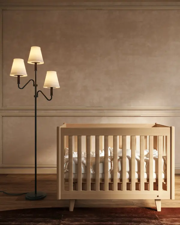 The Sloan Floor Lamp reimagines classic design with contemporary flair. At 68 inches tall, it features textured arms, chain details, and a soft white linen shade that creates warm, inviting illumination perfect for reading nooks or ambient lighting. - alternate view