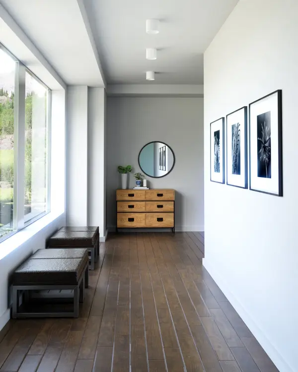 The Falco 5-inch flush mount delivers focused, warm LED illumination through a precision optical lens in a compact, contemporary design. Perfect for hallways, closets, and smaller spaces requiring clean, modern lighting. - alternate view