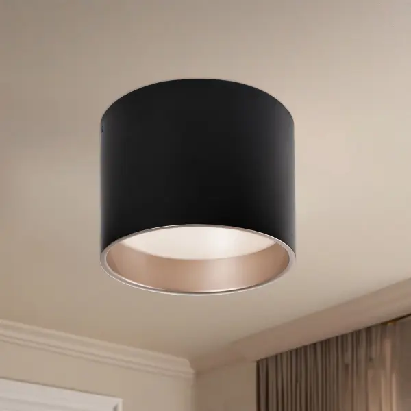 The Mousinni flush mount combines modern aesthetics with practical functionality. Its two-tone design features matte black exterior with champagne gold interior, creating visual interest while the white acrylic diffuser provides soft, even illumination. - alternate view