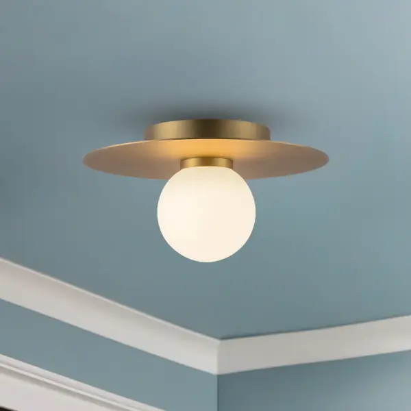 The Elixir flush mount combines sleek chrome finish with opal glass globes for a clean, contemporary look. Its 10-inch profile and integrated LED make it ideal for low-ceiling spaces needing modern style. - alternate view