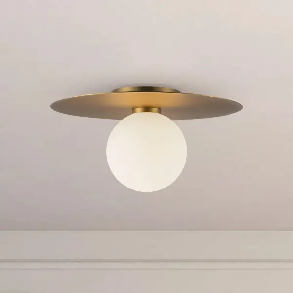 The Elixir flush mount combines sleek chrome disks with soft opal glass globes for a clean, contemporary look. Integrated LED with warm 3000K light makes it ideal for hallways, entryways, and kitchens where low-profile lighting is needed. - alternate view