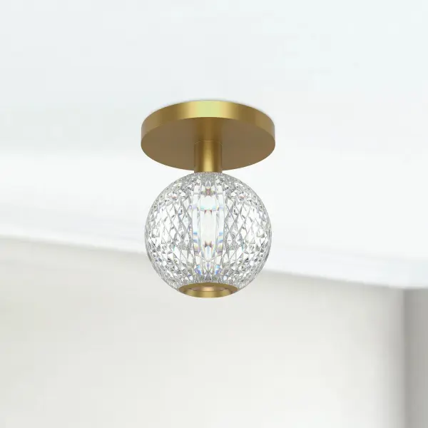 The Marni flush mount features meticulously cut spherical glass shades that create glittering beams of light, adding luxury and visual interest to compact spaces. Perfect for hallways, entryways, and bathrooms. - alternate view