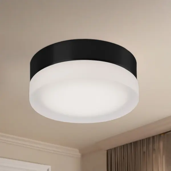 The Bedford 6-inch flush mount combines modern aesthetics with energy-efficient LED technology. Its compact profile and frosted glass diffuser make it ideal for hallways, bathrooms, and entryways where ceiling clearance is limited. - alternate view