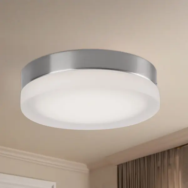 The Bedford 11" flush mount combines contemporary styling with energy-efficient LED technology. Its frosted glass diffuser provides soft, even illumination perfect for hallways, bedrooms, and bathrooms. - alternate view