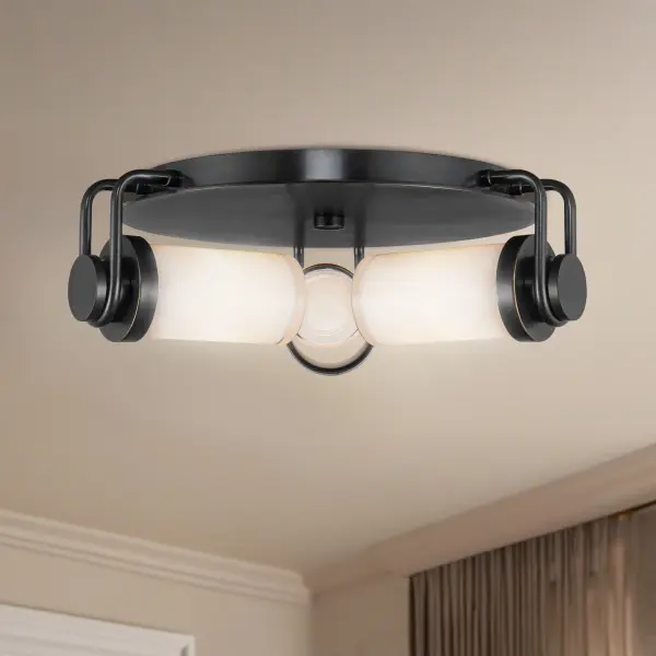 The Wynwood flush mount blends vintage industrial hardware with soft opal glass for a sophisticated look. Its 17-inch profile fits perfectly in hallways, entryways, and kitchens, bringing classic warmth without overwhelming smaller spaces. - alternate view