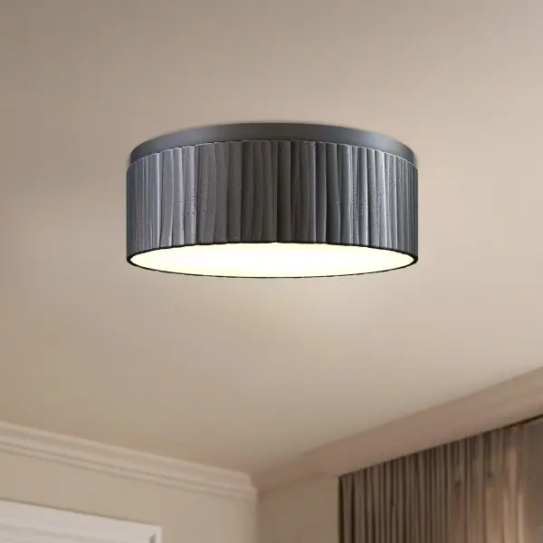 The Kensington flush mount brings high-fashion jewelry aesthetics to ceiling lighting with its unique textured steel elements and sophisticated Urban Bronze finish. Integrated LED technology provides energy-efficient illumination. - alternate view