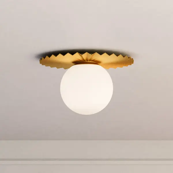 The Plume Flush Mount brings couture-quality design to everyday spaces with its distinctive pleated decorative disk and generous opal glass globe. Perfect for low-ceiling applications where style matters. - alternate view