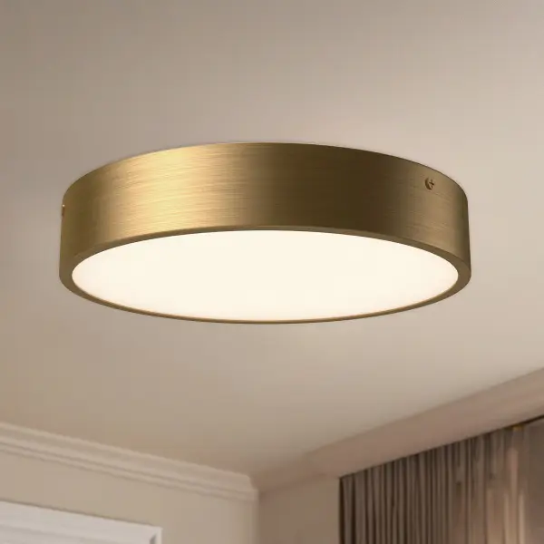 The Adelaide flush mount combines timeless Parisian-inspired design with energy-efficient integrated LED technology. Its 11-inch circular frame in aged gold finish adds sophisticated ambiance to any space. - alternate view