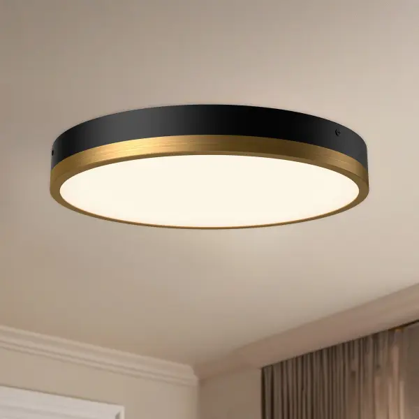 The Adelaide flush mount combines timeless design with modern LED technology. Its mixed metal finish in aged gold and matte black creates visual interest, while the 5 selectable color temperatures offer versatility for any space. - alternate view