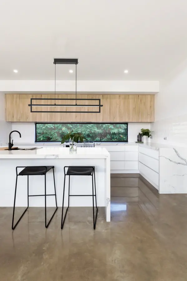 The Mondrian 36-inch linear pendant features an innovative rectilinear frame design that creates an illusion of levitation. Integrated LED technology with warm 3000K lighting provides efficient illumination while the open central void allows visual flow. - alternate view