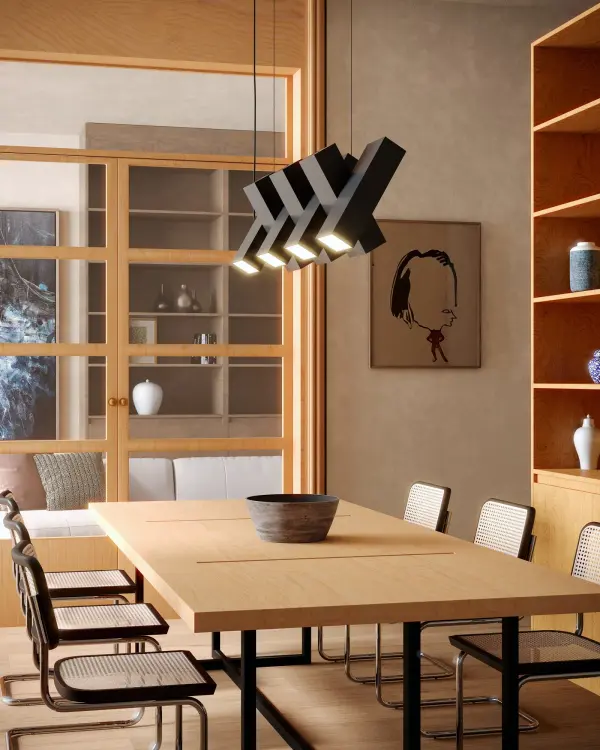 The Domino Linear Pendant delivers a bold, architectural statement with its stacked rectangular profiles and integrated LED lighting. The up-and-down illumination creates dramatic visual interest while providing functional task lighting. - alternate view