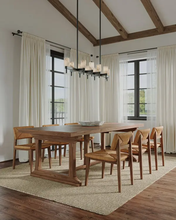The Lucian 52-inch linear pendant masterfully combines antique-inspired shapes with modern design elements. Featuring organically curved backplates, custom stems, and natural alabaster shades with unique veining, this fixture delivers timeless elegance perfect for dining rooms and kitchen islands. - alternate view