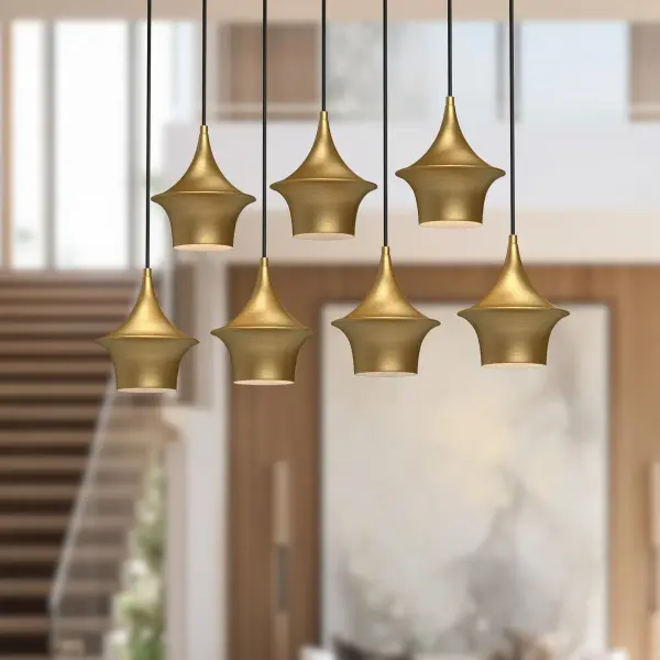 The Emiko Linear Pendant brings Wabi-Sabi philosophy to modern lighting with its sweeping organic metal shade in luxe Brushed Gold. At 36 inches, it's perfectly sized for dining tables and kitchen islands. - alternate view