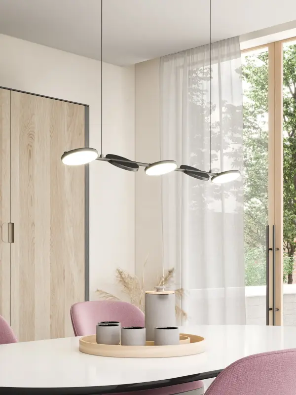 The Novel Linear Pendant combines geometric precision with functional flexibility. Its adjustable disk lights rotate to direct illumination exactly where needed, while the clean-lined black structure adds architectural interest to any space. - alternate view