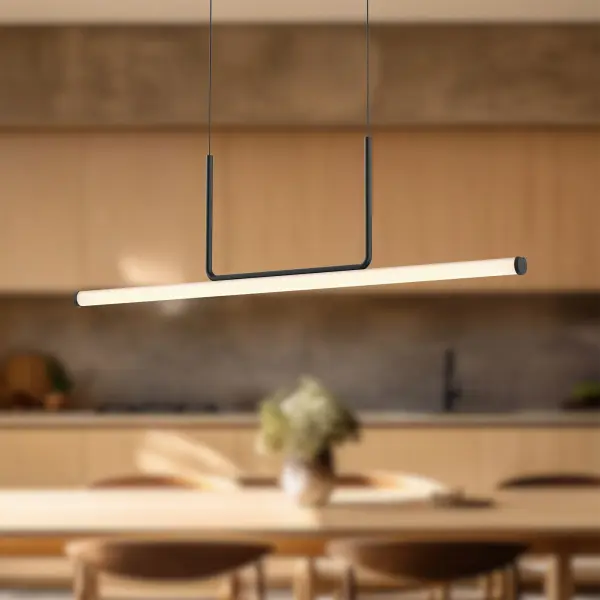 The Vesper 48-inch linear pendant combines industrial design with contemporary softness through its unique U-shaped frame and frosted diffusers. Integrated LED with warm 3000K lighting provides excellent task illumination. - alternate view