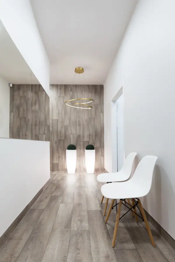 The Twist pendant features a distinctive extruded aluminum loop design with integrated LED lighting and flexible silicon diffuser. Its modern geometric form provides both up and down illumination, perfect for contemporary spaces. - alternate view