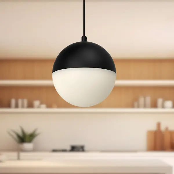 The Monae 6-inch pendant combines mid-century modern charm with contemporary functionality. Its orb-shaped design in brushed gold finish adds a touch of glamour to any space, while integrated 3000K LED provides warm, inviting light. - alternate view