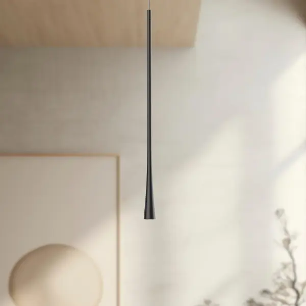 The Taper pendant combines form and function with its elongated die-cast aluminum body and integrated LED spot assembly. The conical shade and vertical stem create striking visual interest while the 3000K warm white LED provides efficient, dimmable illumination. - alternate view