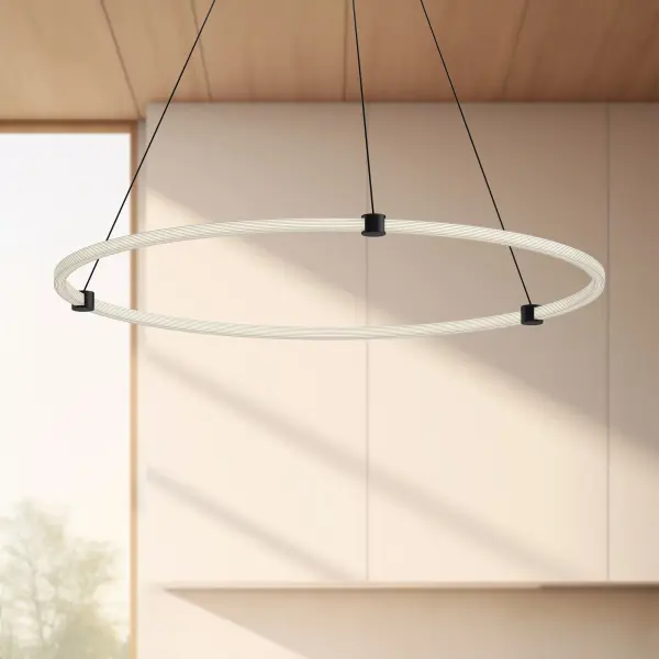 The Bruni 40-inch pendant combines modern geometric design with practical functionality. Its adjustable circular rings offer customizable styling while integrated LED technology provides ample warm lighting for any space. - alternate view
