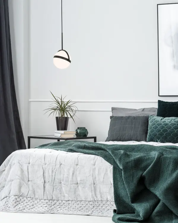 The Globo pendant combines minimalist modern design with functional versatility. Its distinctive tilting globe feature allows you to direct light where needed, while the brushed gold finish adds warmth to contemporary spaces. - alternate view