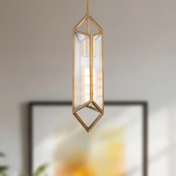 The Cairo pendant brings museum-quality design to your home with its Louvre pyramid-inspired form. Ribbed glass panels meet vintage brass framing for a sophisticated statement piece that bridges classic and contemporary aesthetics. - alternate view