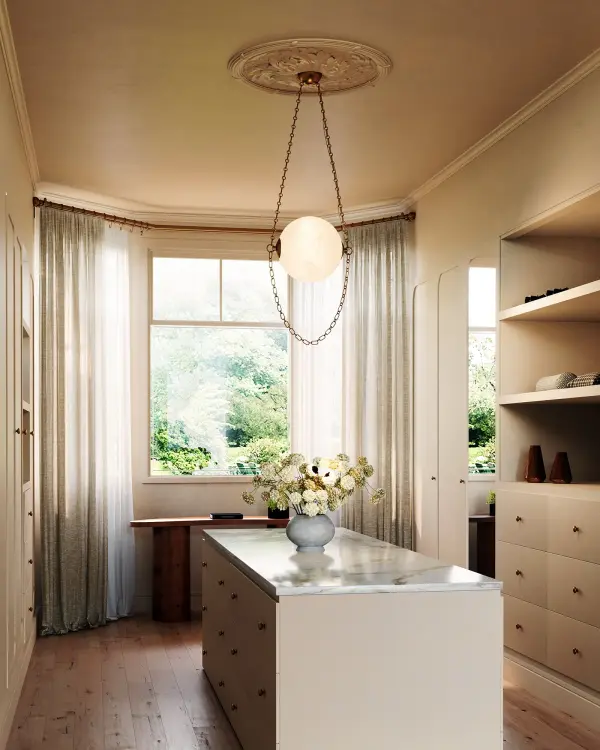 The Petra pendant transforms any space with its luxurious jewelry-inspired design featuring draped custom chains and handcrafted artisan glass. Integrated LED technology eliminates bulb replacement while delivering warm, ambient illumination. - alternate view