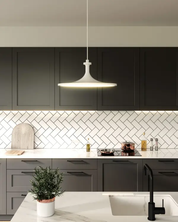 The Issa pendant captures mid-century pottery aesthetics with its simple curves and sloping details. The integrated LED provides warm, energy-efficient lighting while the matte black finish adds contemporary sophistication to any space. - alternate view
