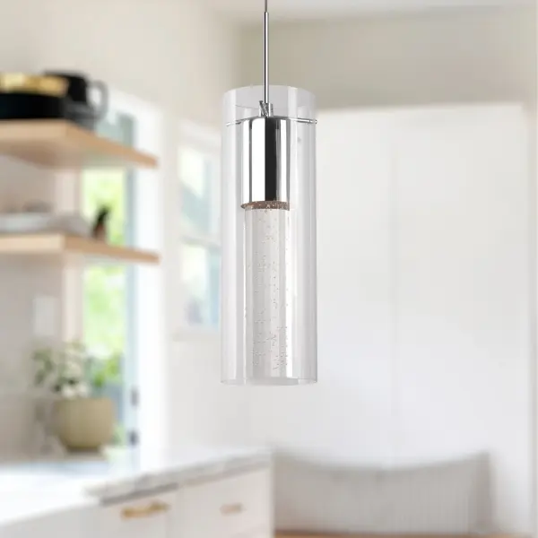 The Champagne pendant combines modern sophistication with decorative flair. Its 4-inch clear glass shade encases crystal bubbles that catch and refract light beautifully, while chrome accents add contemporary polish. Integrated 3000K LED provides warm, inviting illumination perfect for intimate spaces. - alternate view