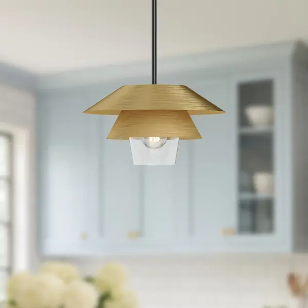 The Tetsu pendant beautifully blends Japandi design principles with contemporary lighting. Its layered metallic shades create visual depth while the brushed gold finish and clear glass top add warmth and sophistication. - alternate view