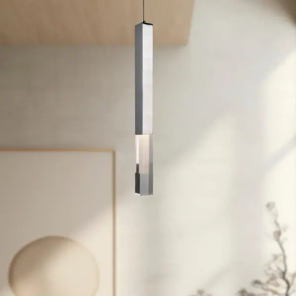 The Martelo pendant combines polished chrome with quartz-like acrylic segments for a dramatic, modern look. Its compact 5-inch size makes it perfect for multiples over islands or as accent lighting in contemporary spaces. - alternate view