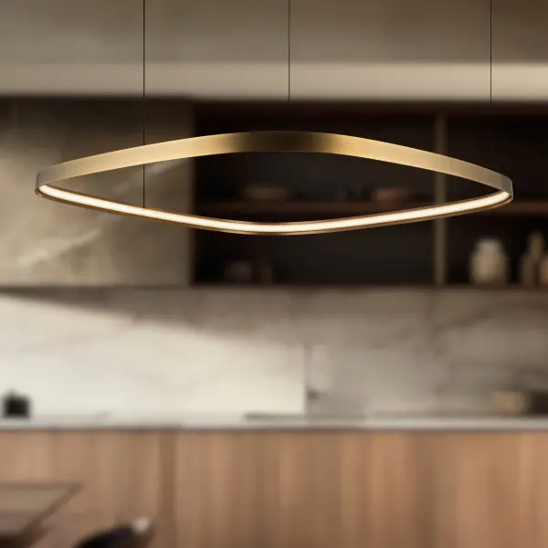 The Yukon 40-inch pendant combines timeless contemporary design with modern LED efficiency. Its substantial size and luxurious vintage brass finish make it perfect for kitchen islands and dining rooms, while versatile mounting options provide installation flexibility. - alternate view