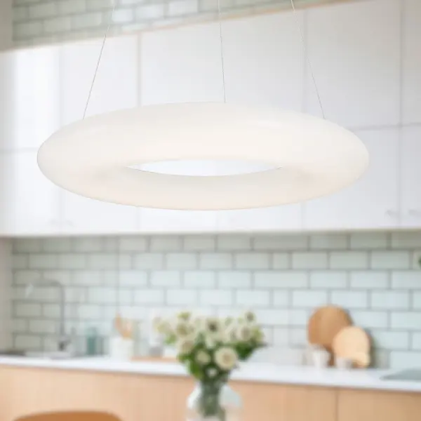 The Cumulus 36-inch pendant delivers a striking torus of bright, even LED illumination perfect for contemporary spaces. Its substantial size and clean design make it ideal for dining rooms and kitchen islands seeking modern sophistication. - alternate view