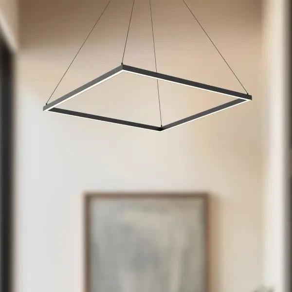 The Piazza 32-inch pendant combines clean architectural lines with practical illumination. Its extruded aluminum profile and flush diffuser create even, glare-free downlight perfect for task and ambient lighting in contemporary interiors. - alternate view