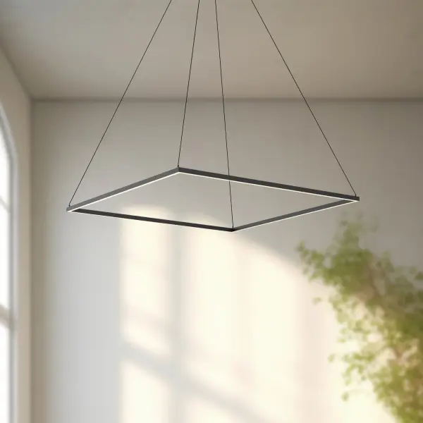 The Piazza 48-inch pendant combines minimalist design with practical functionality. Its extruded aluminum rectangular profile and flush silicone diffuser deliver even, glare-free illumination perfect for kitchen islands and dining tables. - alternate view