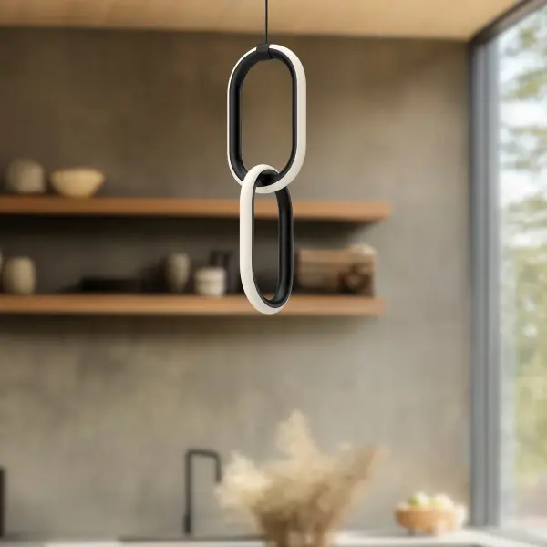 The Airen pendant brings sophisticated elegance with its interlocking oval chain link design and integrated LED lighting. Perfect for modern spaces seeking both functional illumination and artistic statement. - alternate view