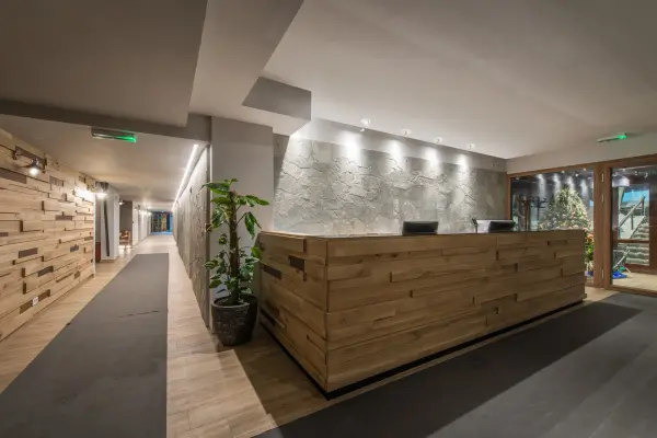 The Downey 2-inch semi-flush mount delivers focused task lighting in a compact, modern design. Its adjustable spotlight assembly and slim LED technology create a minimalist aesthetic perfect for contemporary spaces. - alternate view