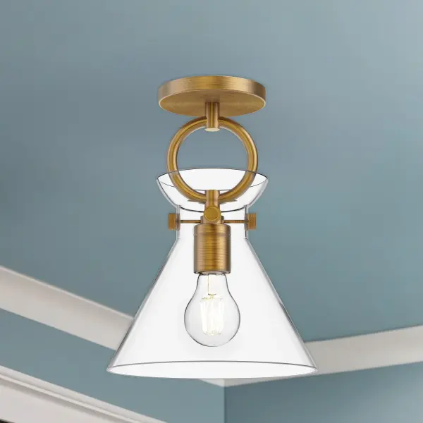 From a cozy cottage to an artfully eclectic space, the Emerson transforms to fit any mood. With handsome metallic details and five unique shade shapes to choose from, this collection provides endless inspiration. Mix and match this collection to fit your mood with hardware, shade, and mixed metal finish options. 60W E26 or equivalent bulb required, not included Designed for hallway, entryway, kitchen, and beyond Classic Style with Decorative Details Installation hardware included Easy assembly instructions included in box - alternate view