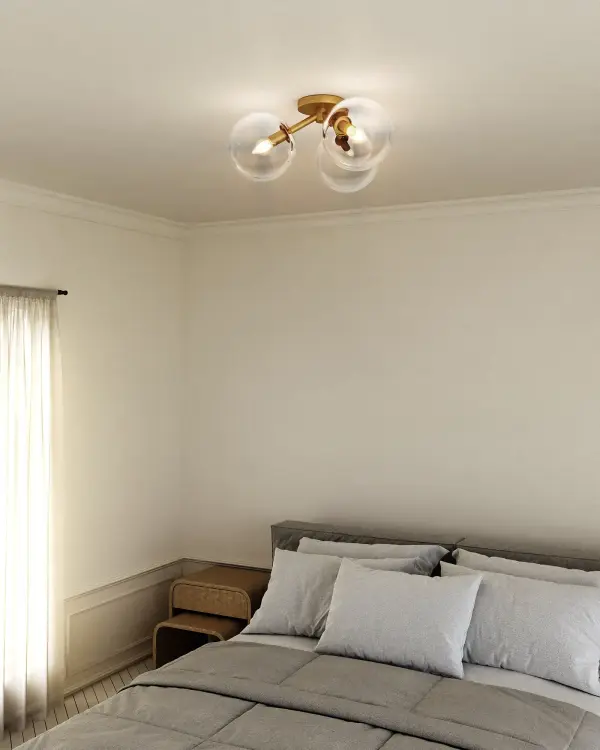 The Cassia semi-flush mount brings playful mid-century flair with its Sputnik-inspired arms and clear glass globes. Perfect for adding personality to hallways, entryways, and kitchens without overwhelming smaller spaces. - alternate view