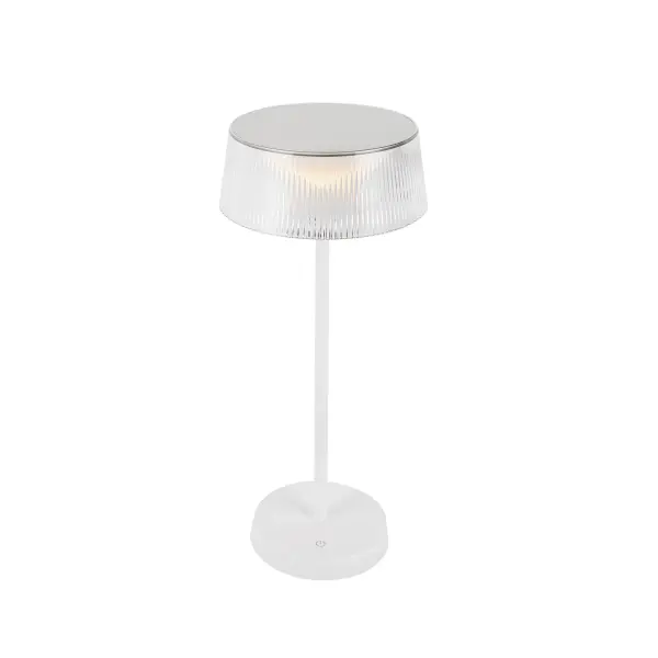 The Tindra combines timeless crystal-inspired elegance with modern convenience. Its ribbed acrylic shade creates beautiful light diffusion while the rechargeable battery offers placement flexibility anywhere in your home. - alternate view