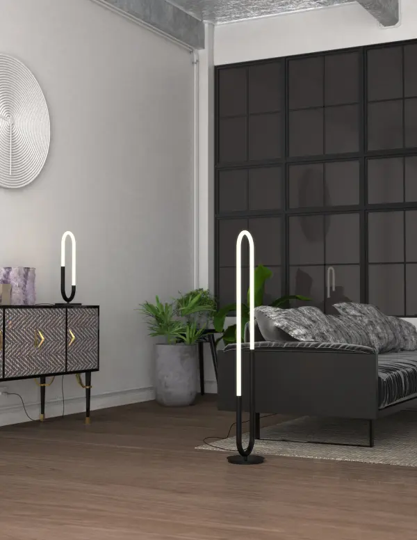 The Huron table lamp combines modern minimalist design with practical functionality. Its brushed gold finish and frosted acrylic tube create ambient lighting perfect for multiple residential settings. - alternate view