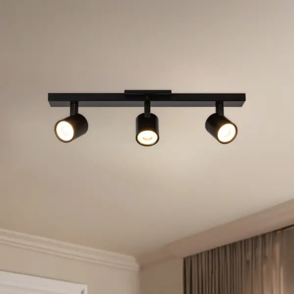 The Arnold 3-Head Track Light combines contemporary style with practical functionality. Featuring integrated LED with selectable color temperatures and adjustable cylinder heads for customized task lighting. - alternate view