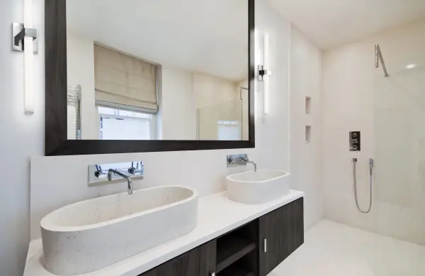 The Fresno vanity light combines minimalist design with practical functionality. Its linear opal glass tube and chrome finish create a clean, contemporary look perfect for modern bathrooms and hallways. - alternate view