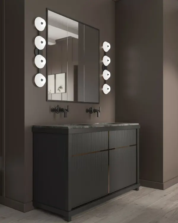 The Holt 30-inch vanity light brings dramatic pyramid detailing and warm integrated LED lighting to contemporary bathrooms. Its brushed gold finish and opal glass diffusers create a sophisticated focal point. - alternate view